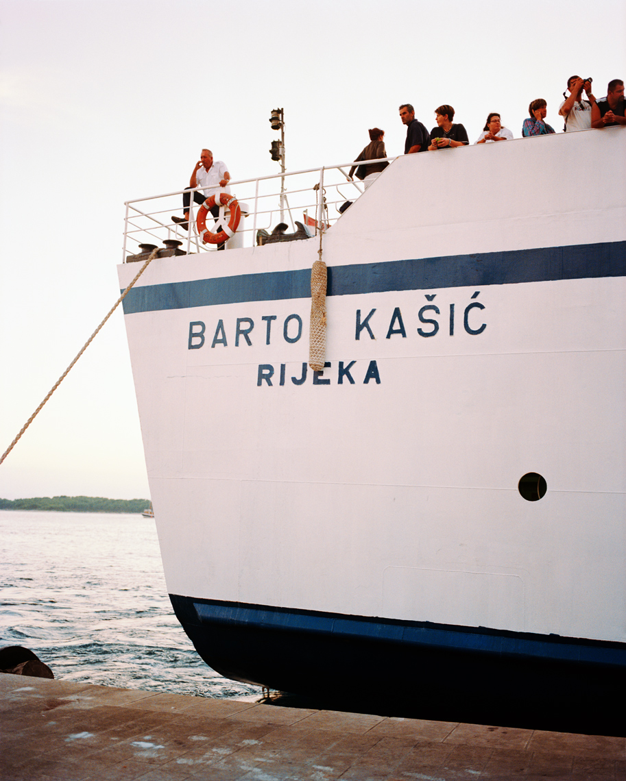 CROATIA, Hvar, Dalmatian Coast, Island, moored ferry with passengers ready to depart in Hvar Island.