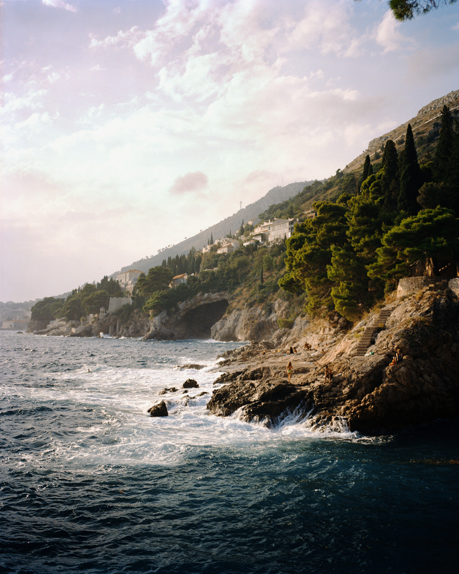 CROATIA, Dubrovnik, Dalmatian Coast, waves dashing on rocky mountain