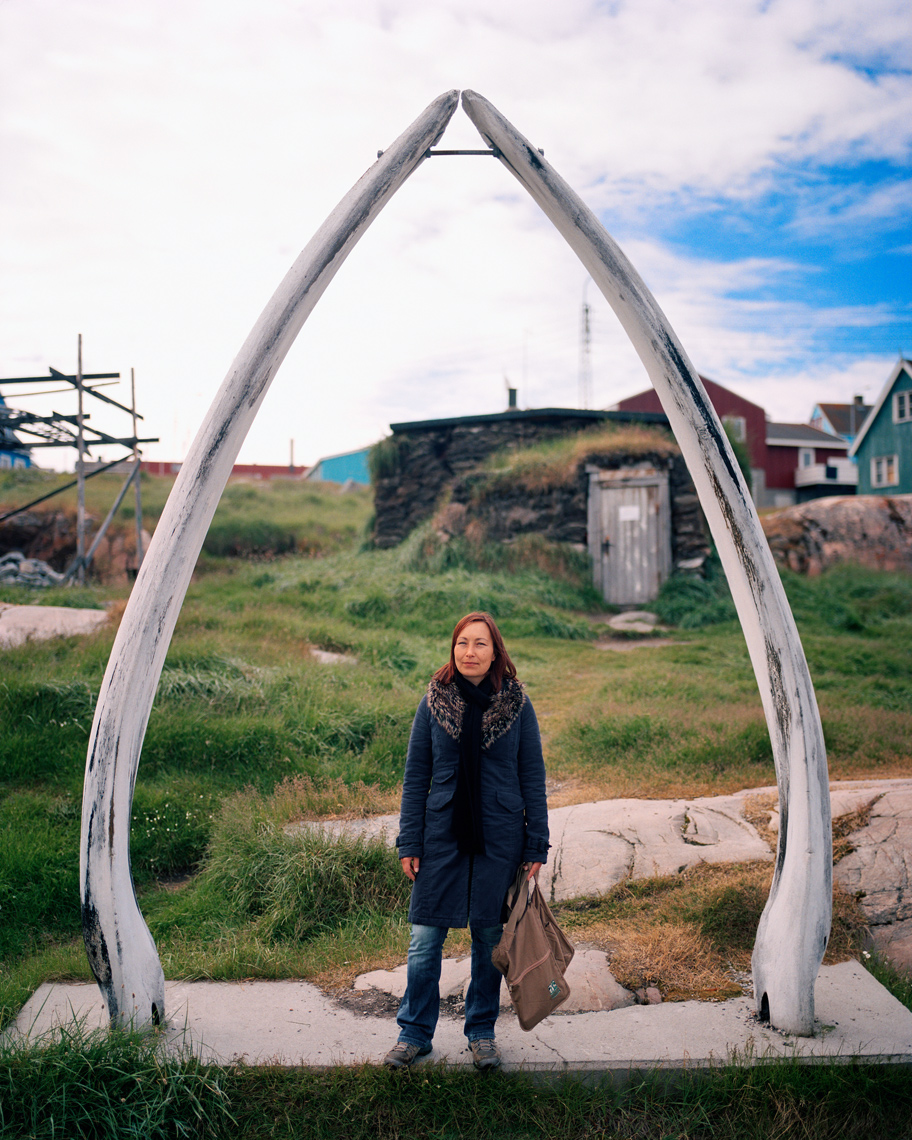 GREENLAND, Ilulissat, Knud Rasmussen Museum, portrait of young local with whale tusks